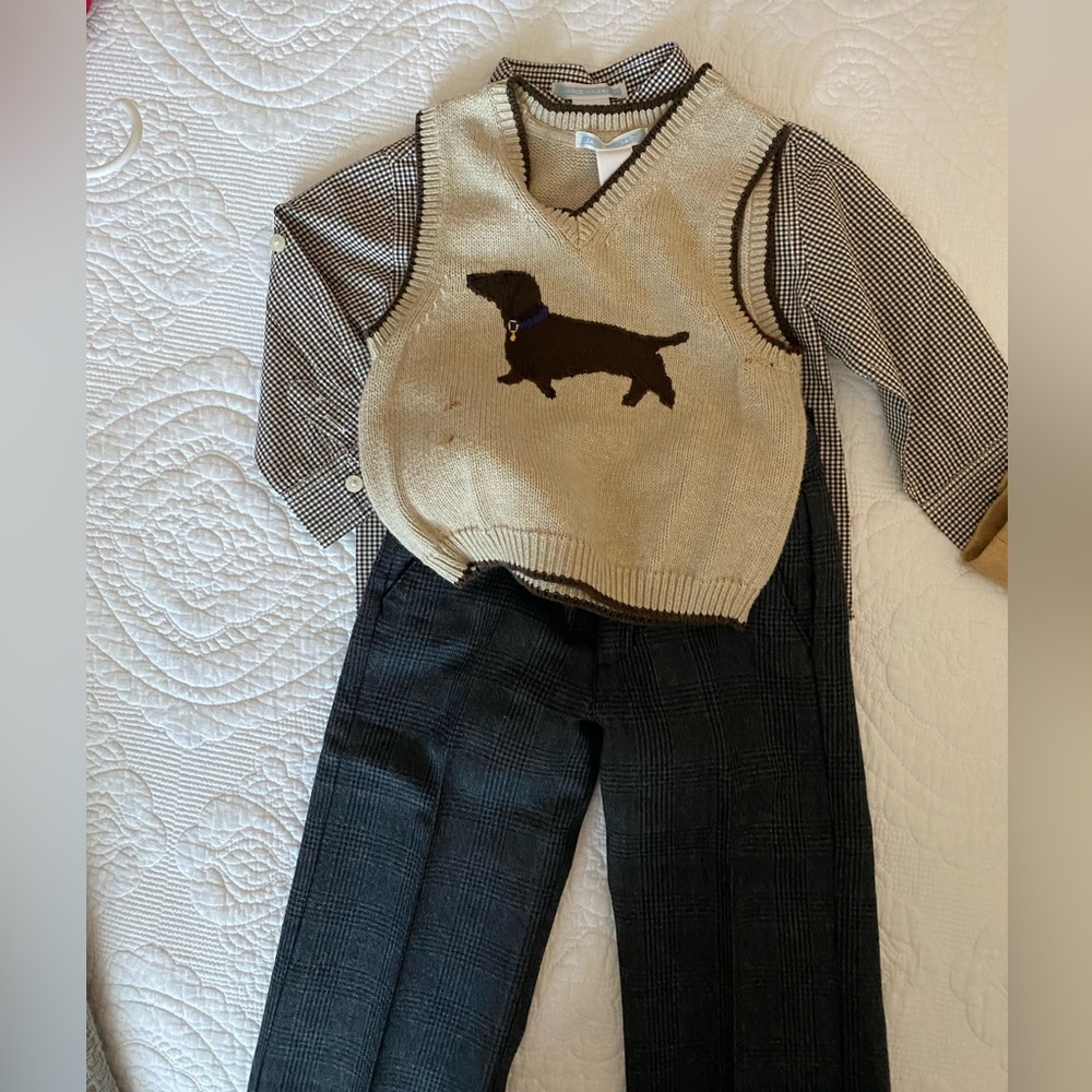 Long sleeve, black pants and vest